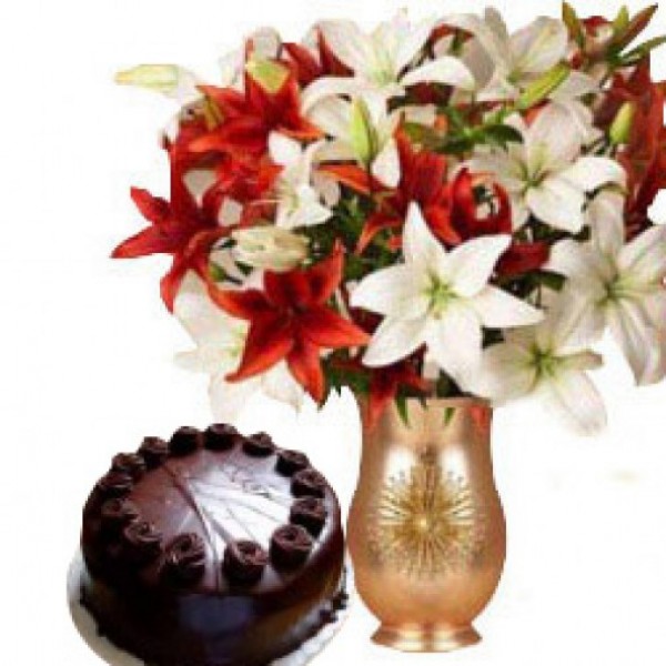  3 Red Oriental Lilies and 3 White Oriental Lilies with Dark Chocolate Cake (Half Kg) in a Glass Vase